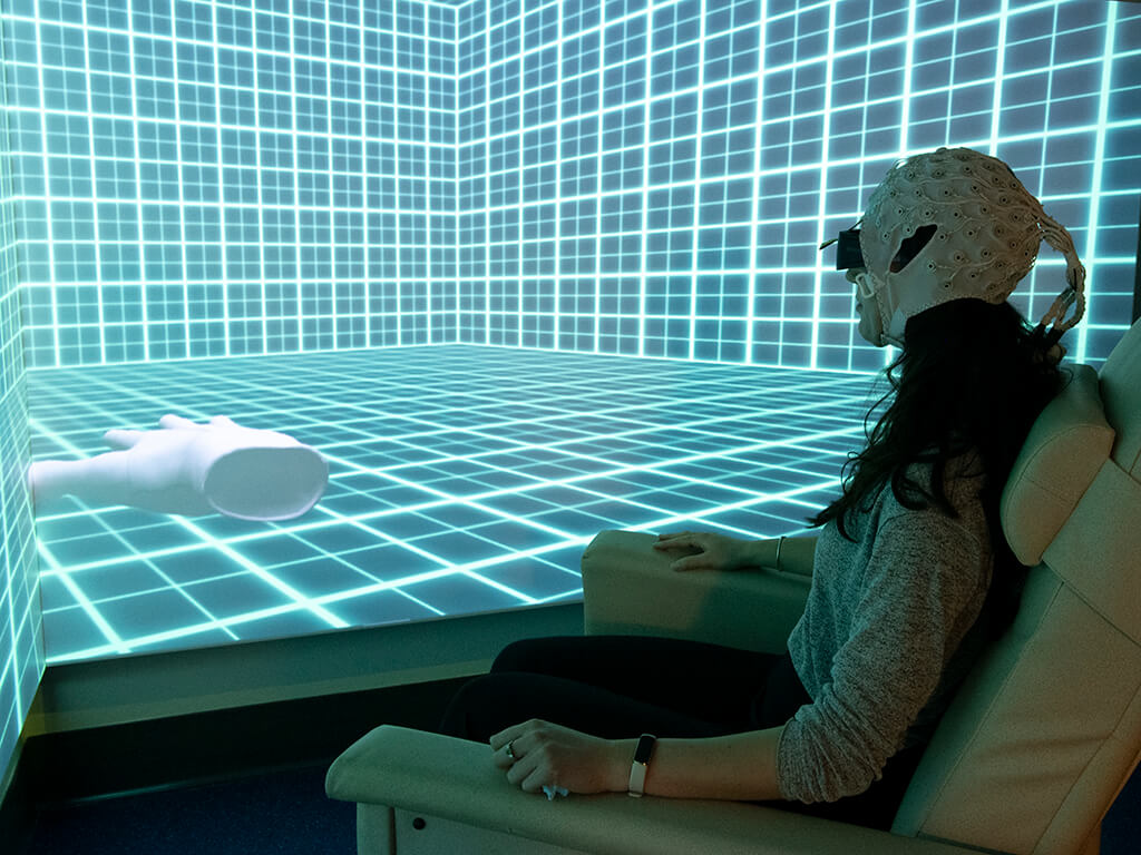 Woman in chair using VR