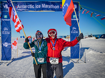 Susan Ragon and Ignacio Inglessis-Azuaje, MD, after completing the Antarctic Marathon in 2019.